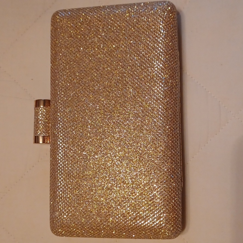 Women's gold colored clutch.